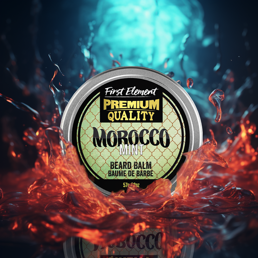 Image of a sleek 2oz metal tin of Morocco Mint scented Beard Butter with a screw-on top and tamper-evident seal, hand-poured in small batches in Canada. The tin sits against a backdrop of greenery, reflecting the natural ingredients used in the product.